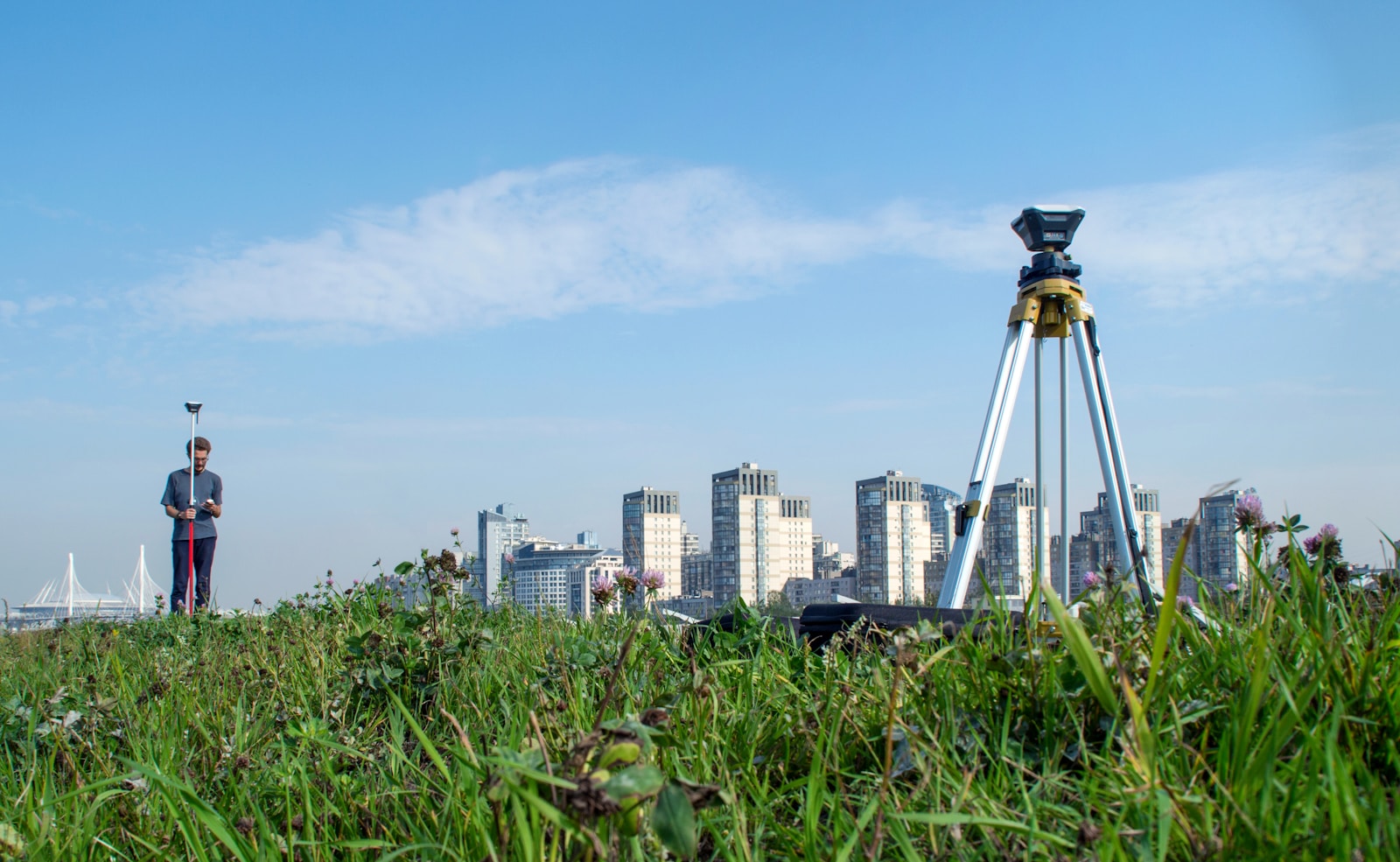 city skyline under blue sky during daytime